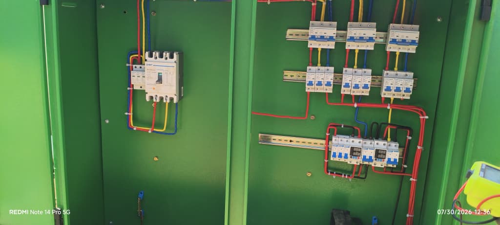 Green industrial electrical distribution board wired by JCL