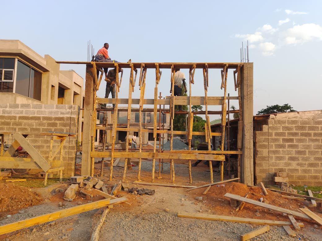 JCL crew assembling timber formwork for a reinforced concrete wall plate
