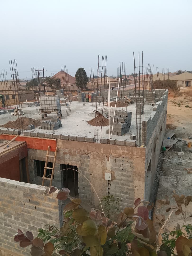 Suspended slab completed with rebar starter bars ready for the next floor